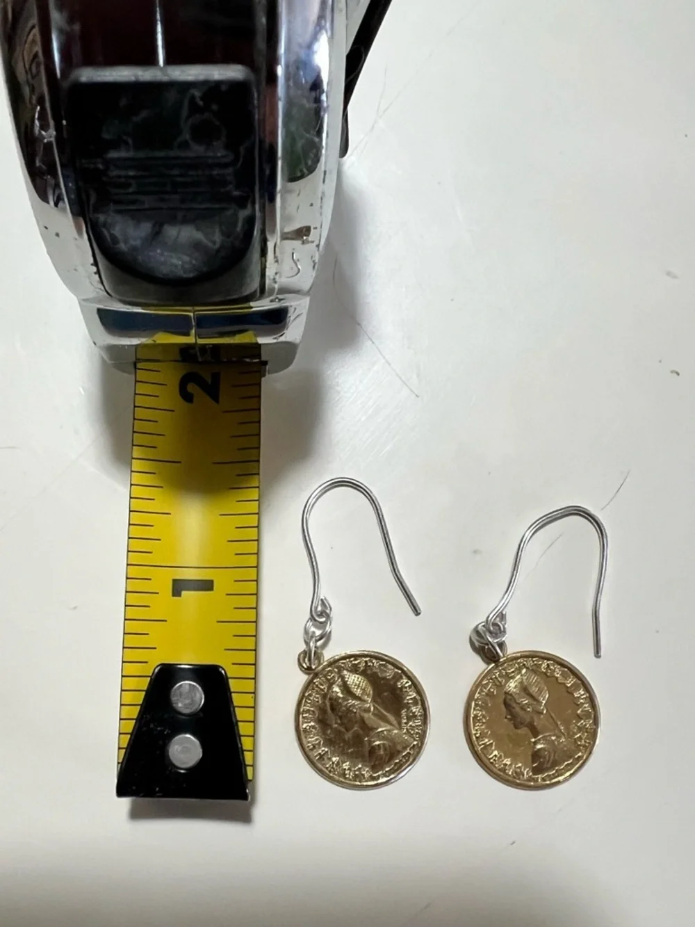 Two tone Italian 500 Lire coins on sterling silver hook earrings.